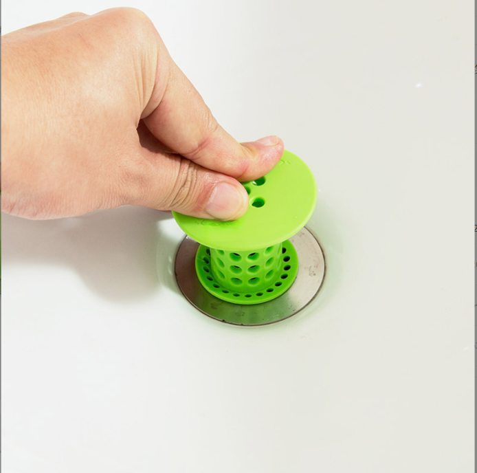 Pulling the hair catcher out of a tub drain