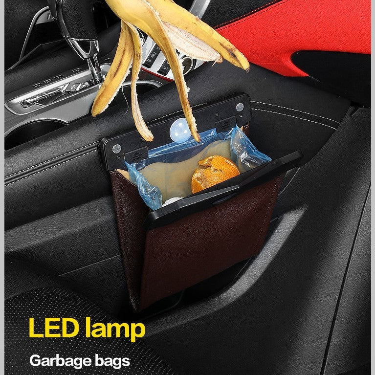 Hanging car trash bin with LED light and trash bag inside