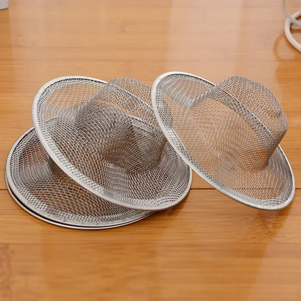 Mesh sink strainers on a table