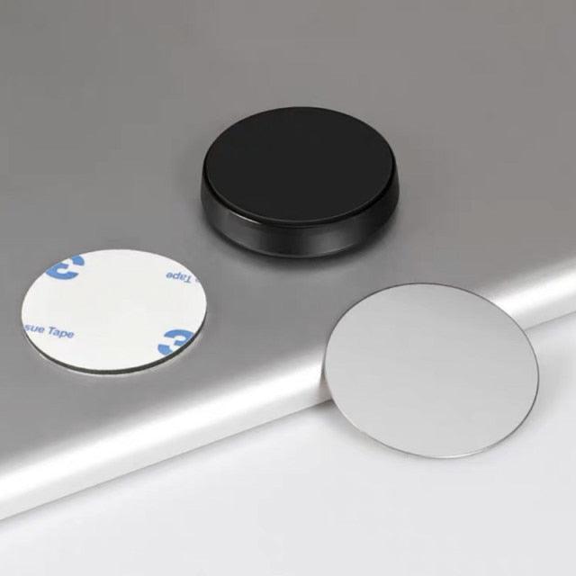Black magnetic phone mount with metal plate and adhesive pad