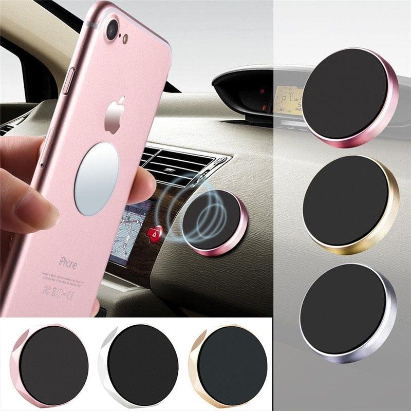 Magnetic car phone mount holding a phone on the dashboard, shown in several finishes